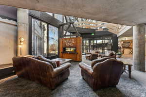 Living area featuring a multi sided fireplace