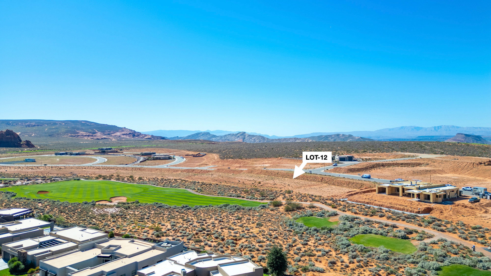 View of mountain background featuring nearby suburban area