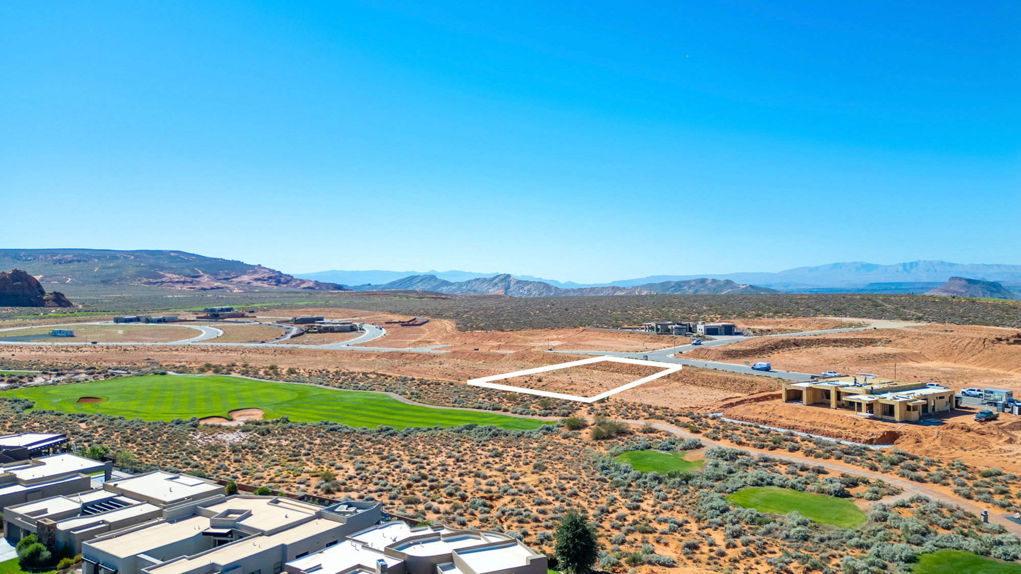 View of mountain backdrop with nearby suburban area