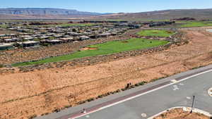 Aerial view of residential area featuring a mountain backdrop