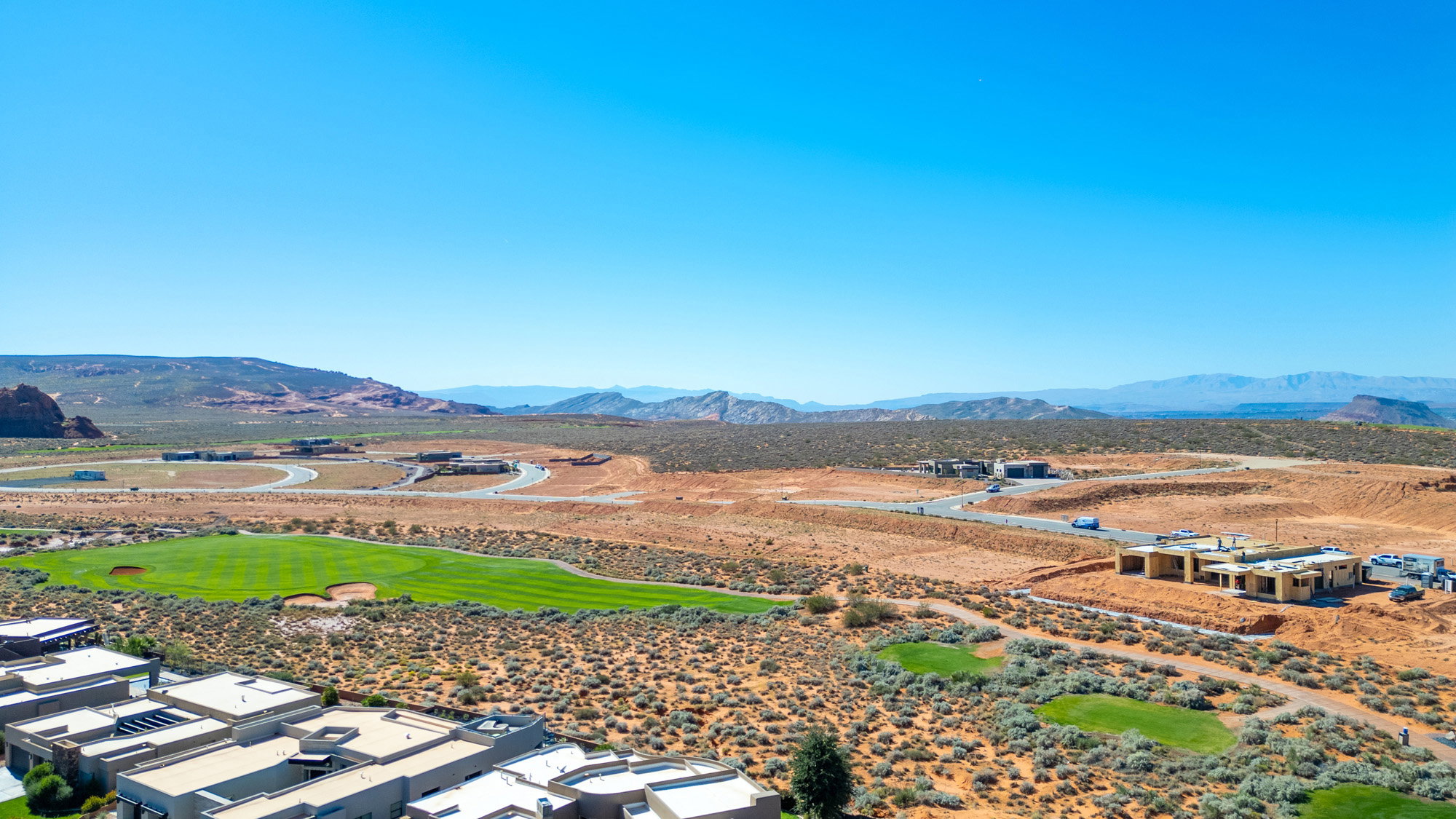 View of mountain background featuring nearby suburban area