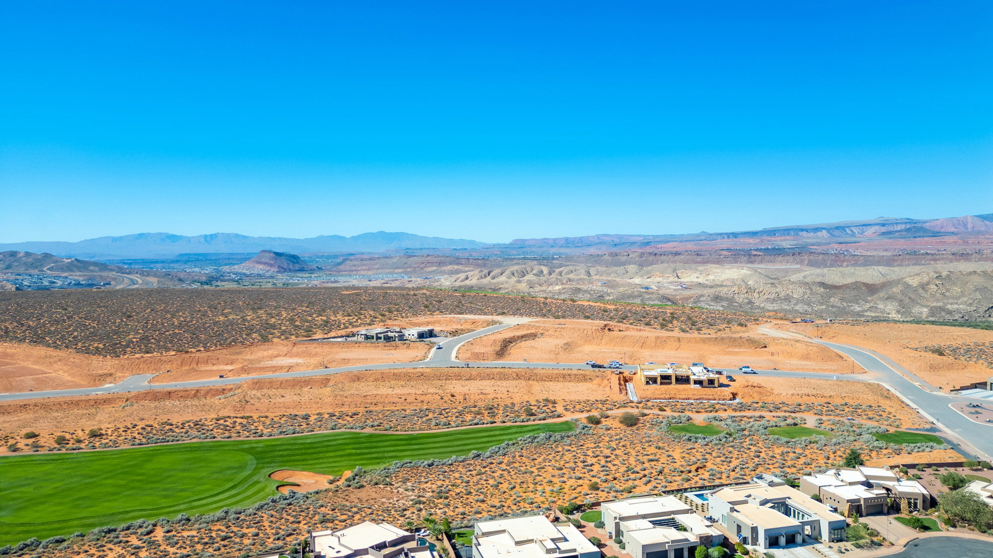 Aerial perspective of suburban area featuring mountains
