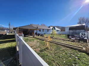 Back of property featuring a patio area