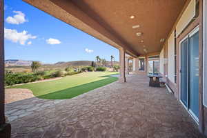 View of patio / terrace with a mountain view