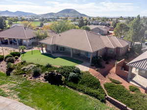 Aerial perspective of suburban area featuring a mountainous background