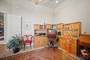 Office area with carpet, ceiling fan, and recessed lighting