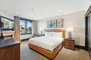 Bedroom featuring recessed lighting and carpet