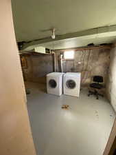 Below grade area with washing machine and dryer