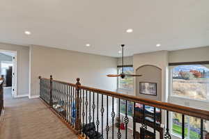 Hallway with carpet flooring and recessed lighting
