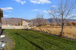 View of yard with a mountain view