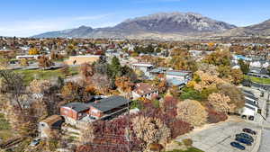 Aerial view of residential area with a mountain backdrop
