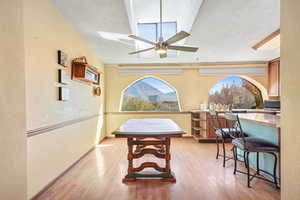 Picture windows throughout kitchen.