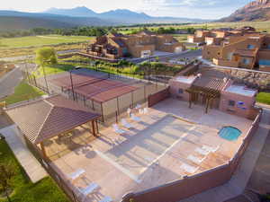 Aerial view of residential area with a mountainous background