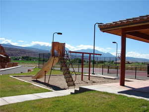 Community playground with a mountain view