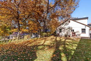 View of yard with a patio area