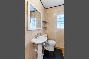 Bathroom with tile walls