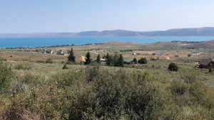 View of mountain background with a nearby body of water