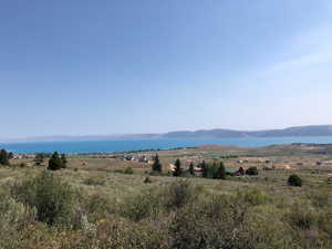 View of mountain background with a nearby body of water