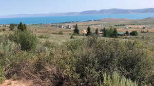 View of mountain background with a nearby body of water