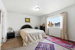 Primary bedroom with baseboards