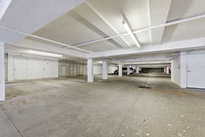 View of underground parking and storage area