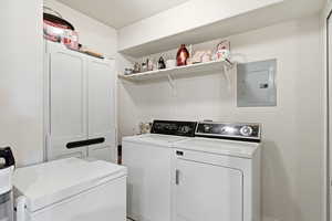 Laundry area featuring separate washer and dryer