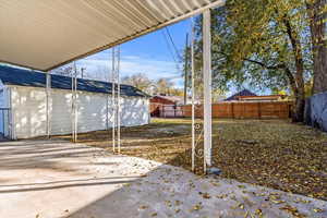 Fenced backyard featuring a patio area
