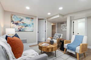 Sitting room featuring recessed lighting and wood finished floors