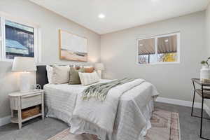 Bedroom featuring recessed lighting and carpet