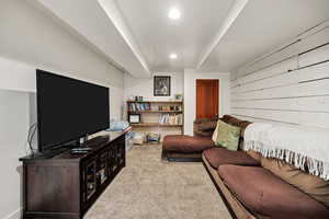 Living room featuring light carpet and recessed lighting