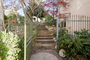 View of yard featuring stairway