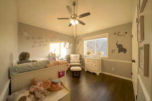 Bedroom featuring dark wood floors and ceiling fan