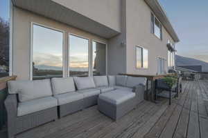Deck featuring outdoor dining area, an outdoor hangout area, and a mountain view