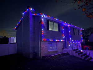 Property exterior at twilight with a chimney