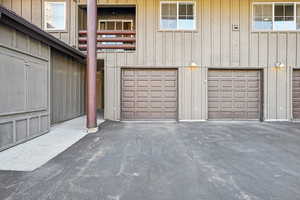 Garage featuring driveway