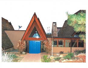 View of front of property featuring a chimney