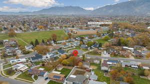 View of property location featuring nearby suburban area and a mountainous background