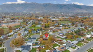 View of property location with mountains and nearby suburban area