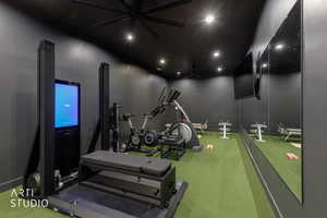 Workout room featuring recessed lighting and a ceiling fan