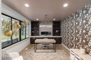 Home office featuring light wood finished floors and recessed lighting