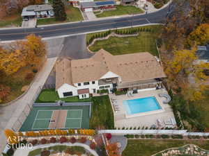 Aerial view of property's location featuring a pool area