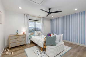 Bedroom with wallpapered walls, attic access, recessed lighting, light wood-style flooring, and access to outside