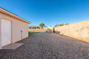 View of fenced backyard
