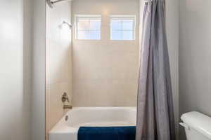 Bathroom featuring shower / tub combo