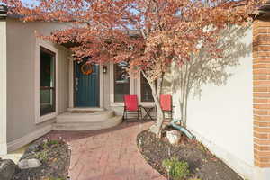 Property entrance with stucco siding