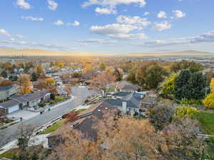 Aerial view of residential area with a mountainous background