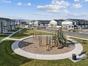 View of community featuring a residential view and a lawn