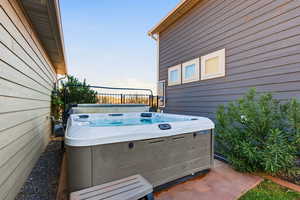 View of patio / terrace featuring a hot tub