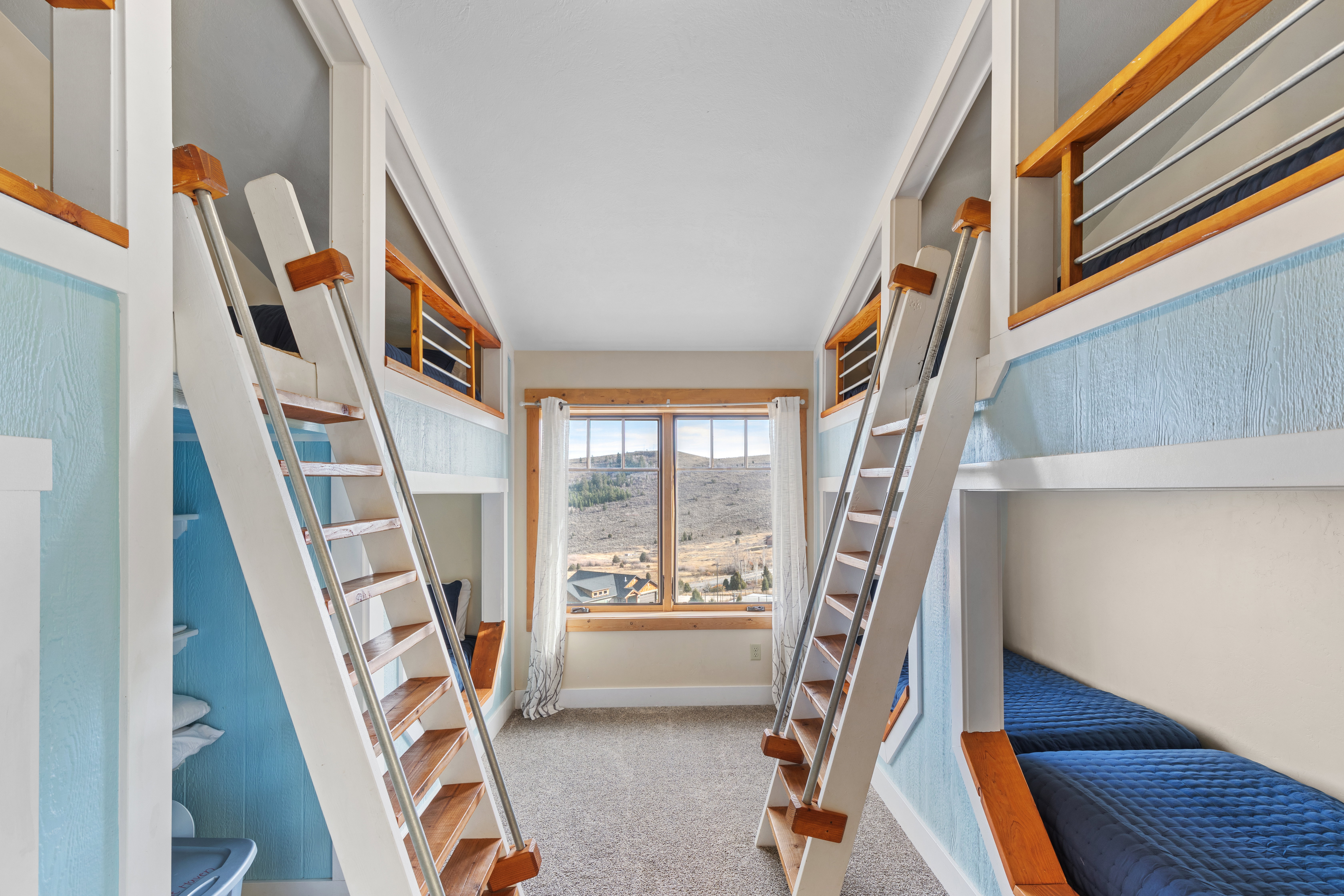 Bedroom with light carpet and baseboards