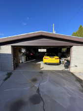 Garage featuring driveway